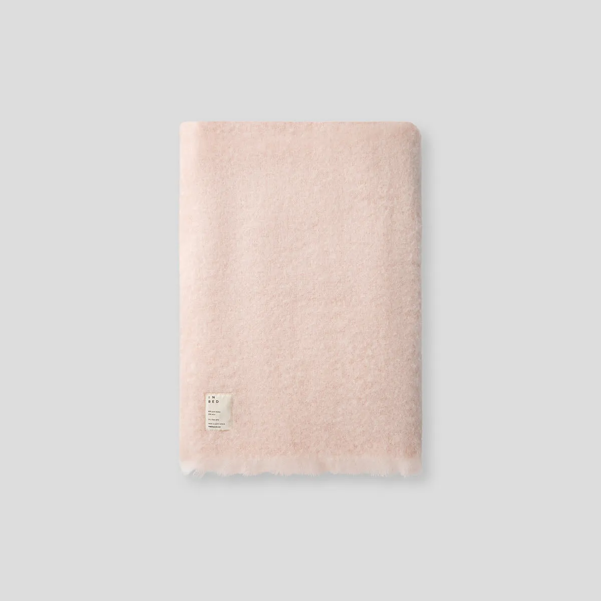 Alpaca Throw Rug in Pink