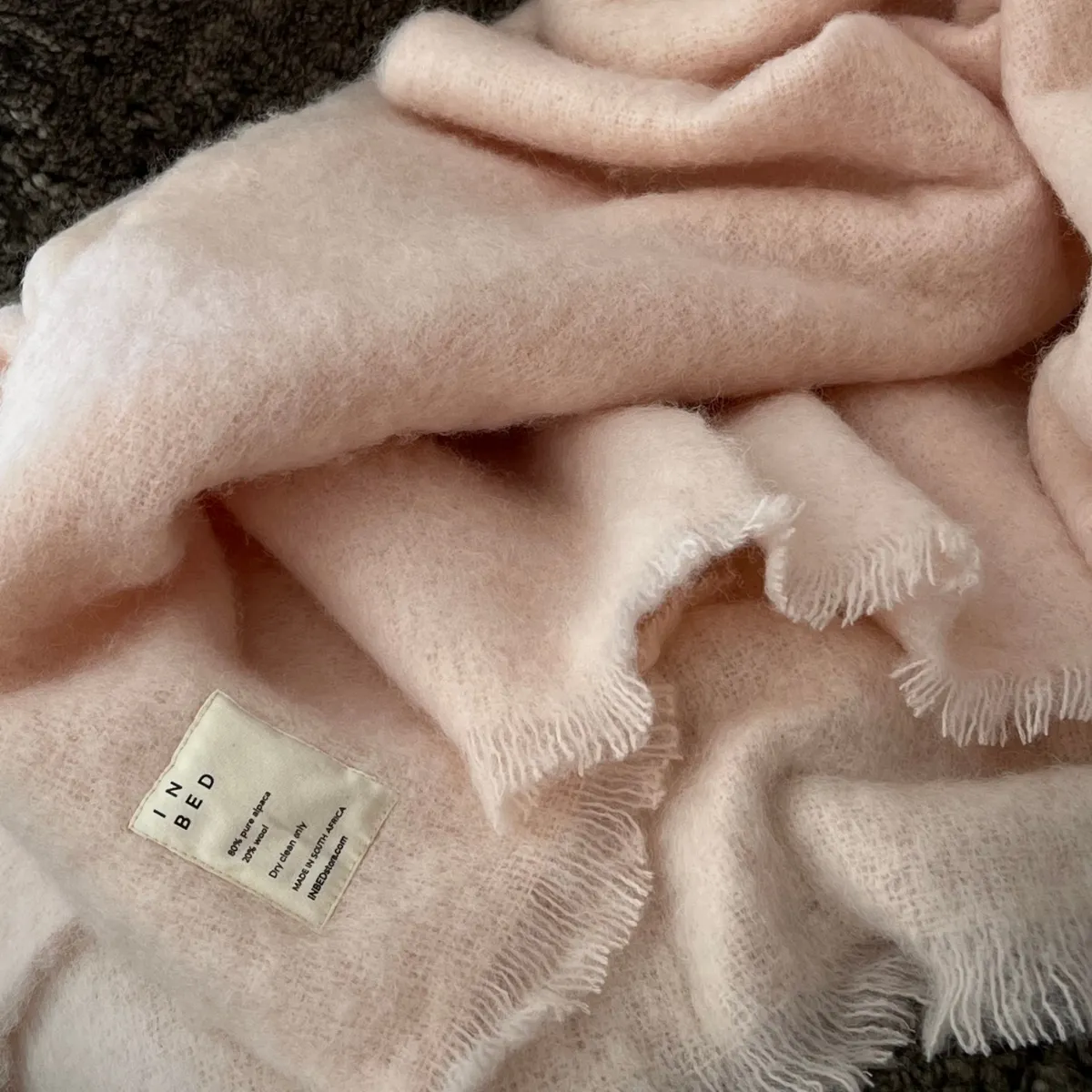 Alpaca Throw Rug in Pink